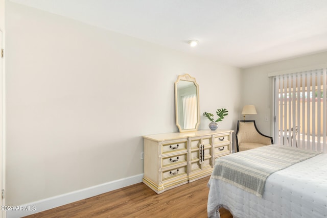 bedroom featuring wood-type flooring