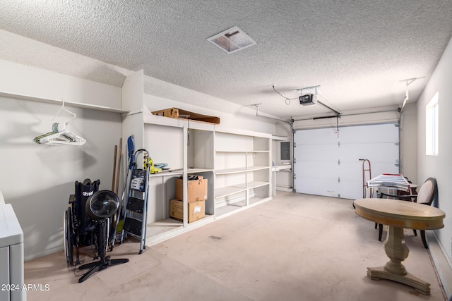 garage featuring a garage door opener