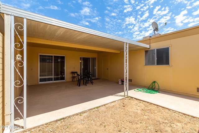 back of house featuring a patio