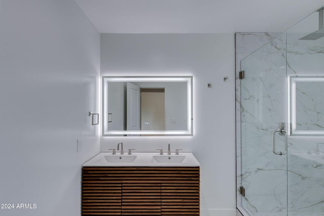 bathroom featuring vanity and walk in shower