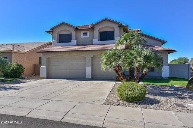 view of front of home with a garage