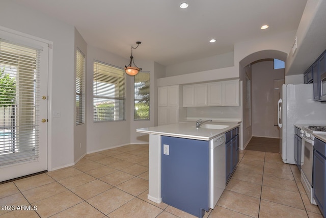 kitchen with blue cabinets, sink, white cabinetry, pendant lighting, and white appliances