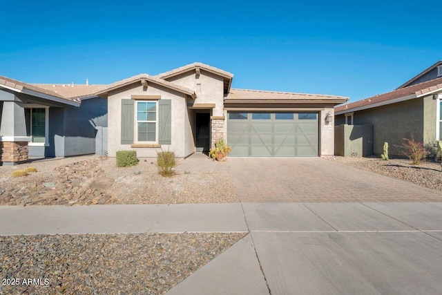 single story home featuring a garage