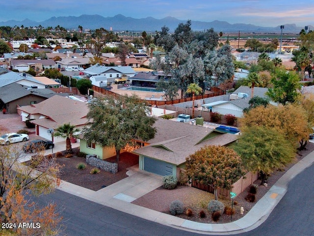 aerial view at dusk with a mountain view