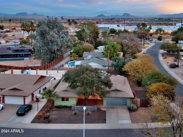 aerial view at dusk with a mountain view