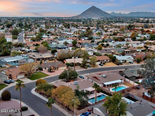 aerial view at dusk with a mountain view