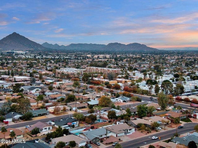 aerial view at dusk with a mountain view