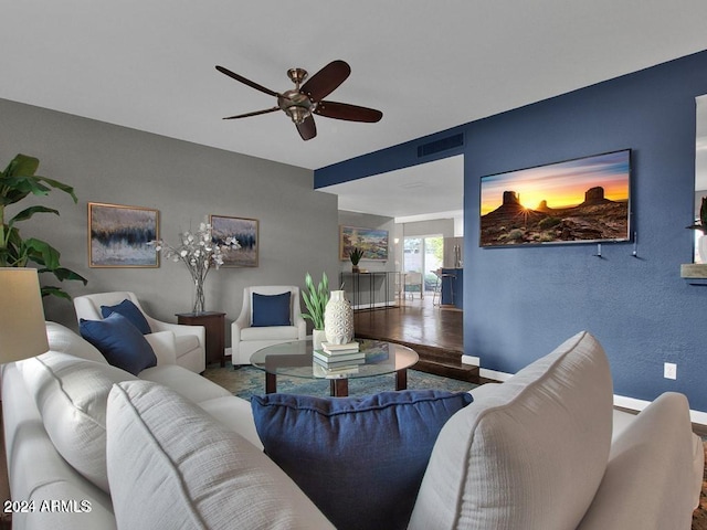 living room with ceiling fan