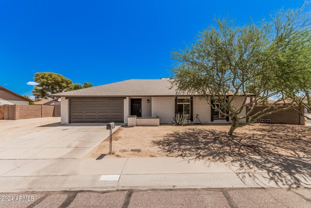 ranch-style house with a garage