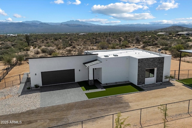 16533 E Dale Ln, Scottsdale, AZ 85262 - view of front facade featuring a mountain view, stucco siding, driveway, and a garage