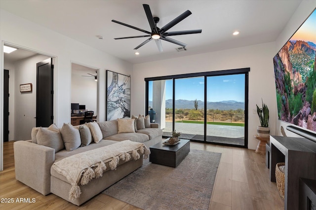16533 E Dale Ln, Scottsdale, AZ 85262 - living area featuring ceiling fan, light wood finished floors, and recessed lighting