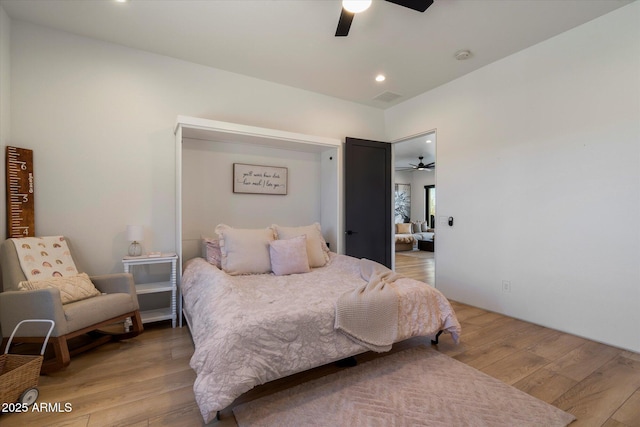16533 E Dale Ln, Scottsdale, AZ 85262 - bedroom featuring light wood-style flooring and ceiling fan