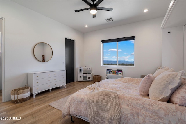 16533 E Dale Ln, Scottsdale, AZ 85262 - bedroom featuring light wood-type flooring, recessed lighting, and a ceiling fan