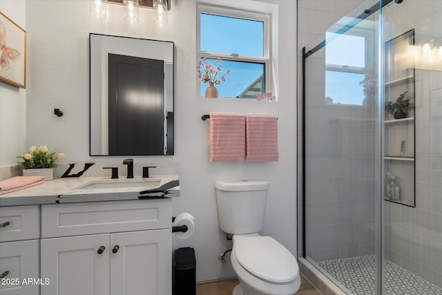 16533 E Dale Ln, Scottsdale, AZ 85262 - bathroom featuring vanity, toilet, and a shower stall