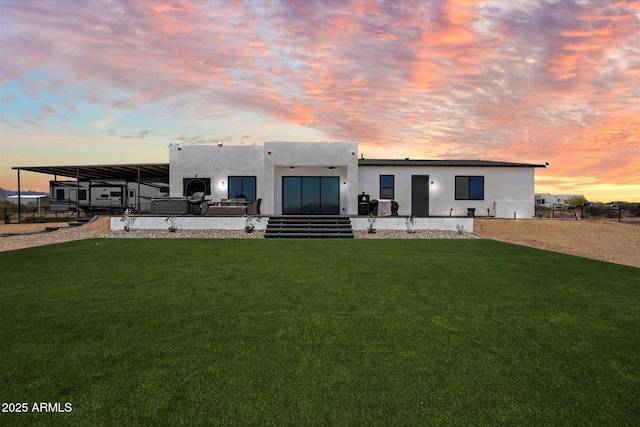 16533 E Dale Ln, Scottsdale, AZ 85262 - back of property at dusk featuring stucco siding