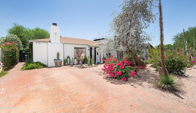 1441 E Hubbell St, Phoenix, AZ 85006 - view of front facade featuring a chimney and stucco siding