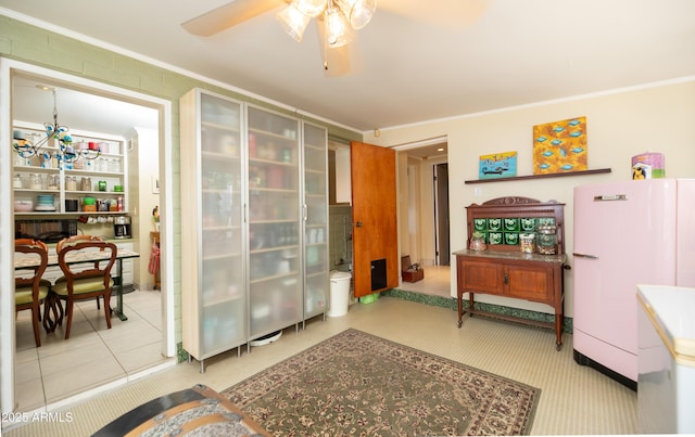 1441 E Hubbell St, Phoenix, AZ 85006 - living area featuring ornamental molding and a ceiling fan