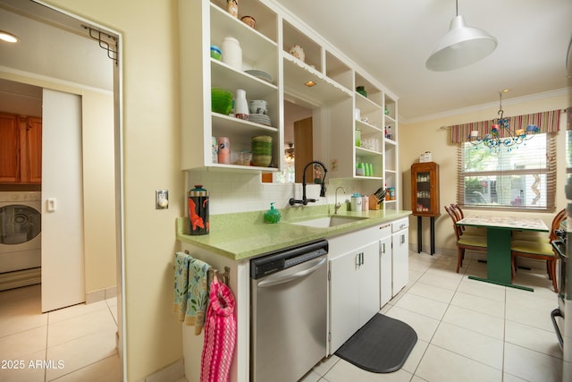 1441 E Hubbell St, Phoenix, AZ 85006 - kitchen with dishwasher, washer / dryer, open shelves, light tile patterned floors, and ornamental molding