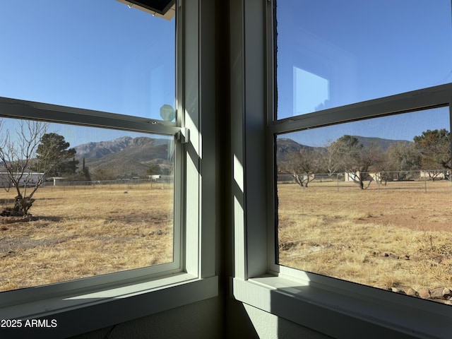 interior details with a mountain view and a rural view