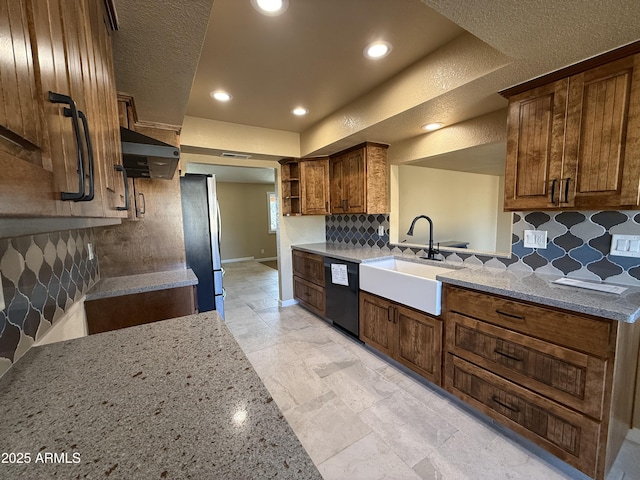kitchen featuring a sink, freestanding refrigerator, baseboards, dishwasher, and light stone countertops