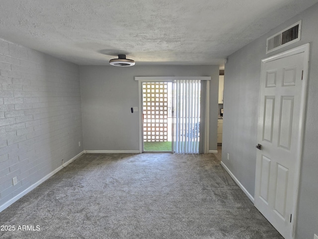 815 N Hayden Rd Unit A205, Scottsdale, AZ 85257 - carpeted empty room with a textured ceiling and baseboards