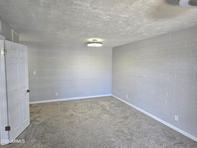 815 N Hayden Rd Unit A205, Scottsdale, AZ 85257 - carpeted spare room featuring baseboards and a textured ceiling