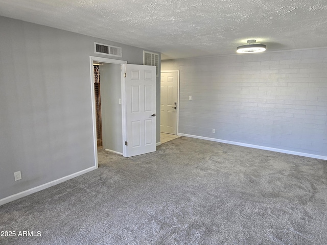 815 N Hayden Rd Unit A205, Scottsdale, AZ 85257 - empty room with a textured ceiling and carpet floors