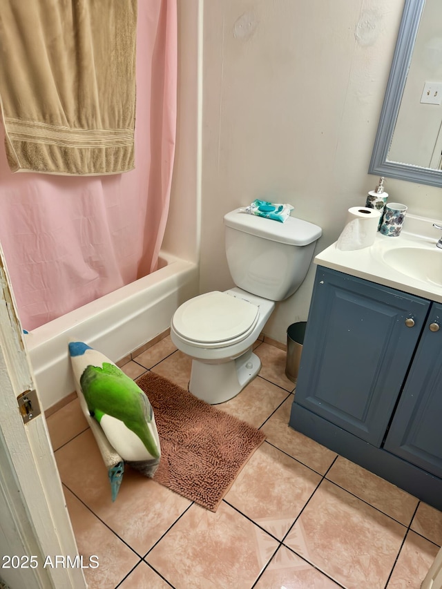 full bathroom featuring tile patterned flooring, vanity, shower / tub combo, and toilet