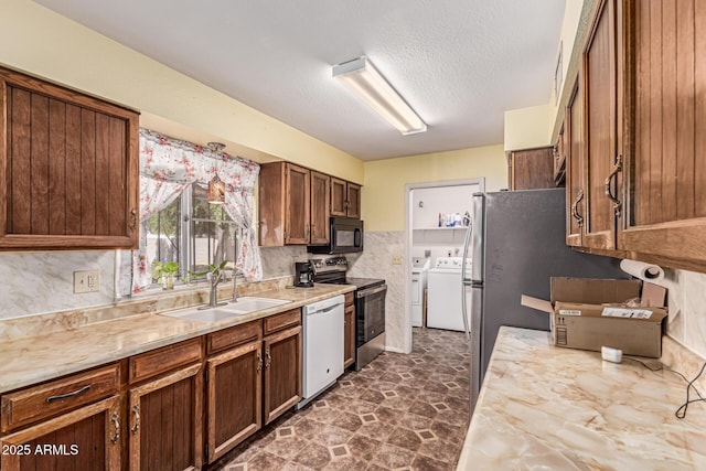 421 S 113th Way, Mesa, AZ 85208 - kitchen featuring electric range, white dishwasher, black microwave, a sink, and separate washer and dryer
