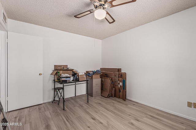 421 S 113th Way, Mesa, AZ 85208 - misc room with a ceiling fan, light wood-style flooring, an office area, a textured ceiling, and baseboards