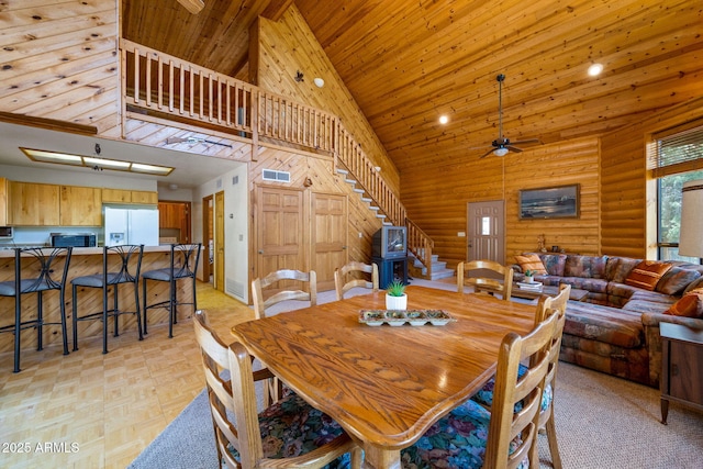 2288 Richenbacher Cir, Overgaard, AZ 85933 - dining area with stairway, high vaulted ceiling, ceiling fan, and wood ceiling