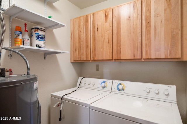 2288 Richenbacher Cir, Overgaard, AZ 85933 - laundry room featuring water heater, cabinet space, and independent washer and dryer