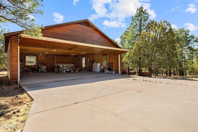 2288 Richenbacher Cir, Overgaard, AZ 85933 - garage with concrete driveway