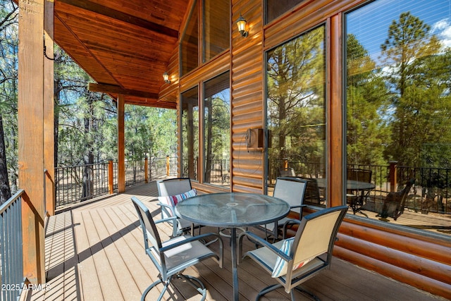 2288 Richenbacher Cir, Overgaard, AZ 85933 - sunroom featuring outdoor dining space and view of wooded area