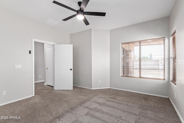 1102 N 5th St, Buckeye, AZ 85326 - unfurnished bedroom featuring carpet flooring and a ceiling fan