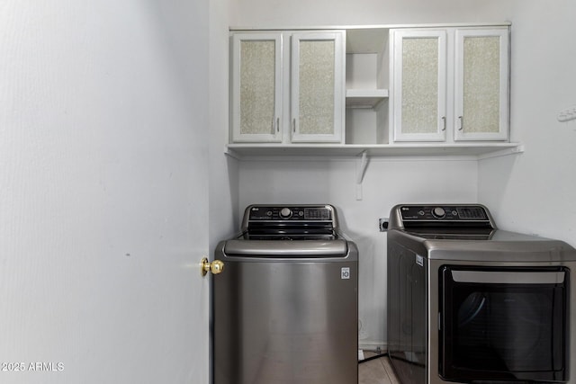 1102 N 5th St, Buckeye, AZ 85326 - laundry area with washing machine and clothes dryer and cabinet space