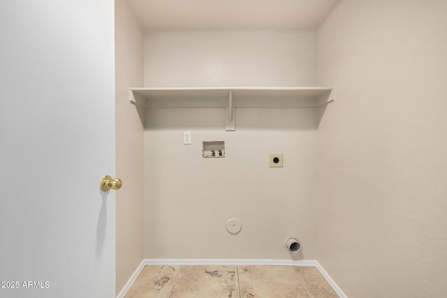 washroom featuring hookup for a washing machine, baseboards, laundry area, electric dryer hookup, and hookup for a gas dryer