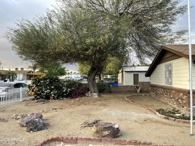 view of yard featuring fence