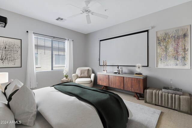 carpeted bedroom featuring ceiling fan