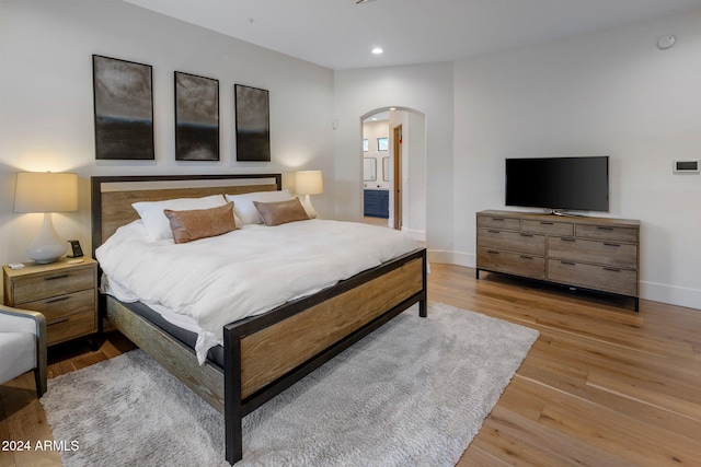 bedroom featuring light hardwood / wood-style floors