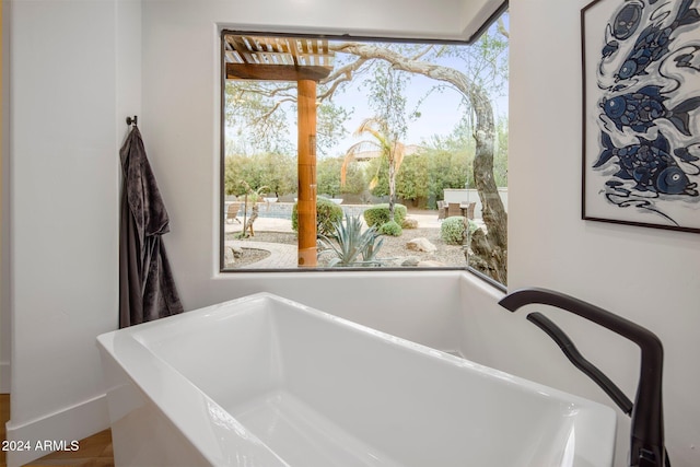 bathroom featuring a bath