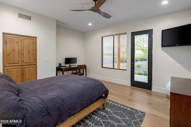 bedroom featuring ceiling fan, access to exterior, and light wood-type flooring