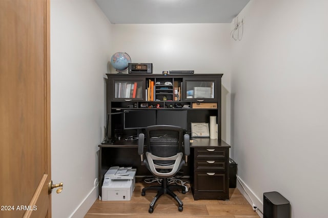 office area with hardwood / wood-style flooring