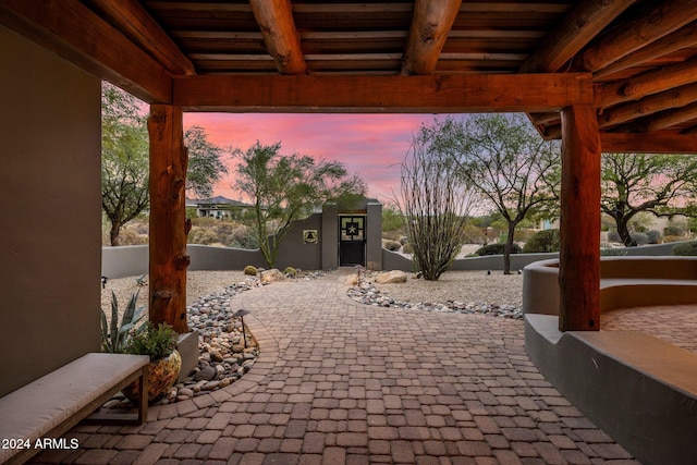 view of patio terrace at dusk