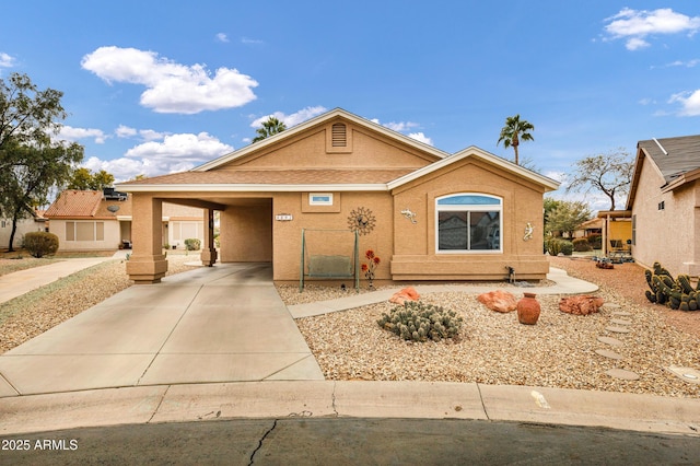 view of front of home featuring a carport