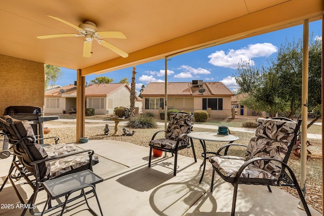 view of patio featuring ceiling fan