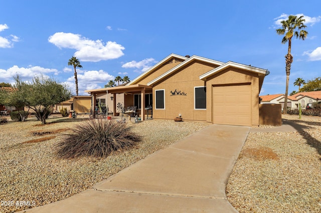 view of front of home with a garage