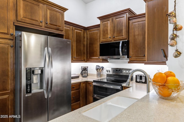 kitchen with appliances with stainless steel finishes