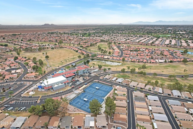 birds eye view of property featuring a mountain view