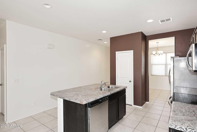 29932 N Paloverde Dr, Florence, AZ 85132 - kitchen with stainless steel appliances, a sink, light tile patterned flooring, light countertops, and a chandelier
